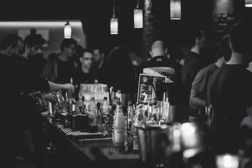 Travelers in an expat bar