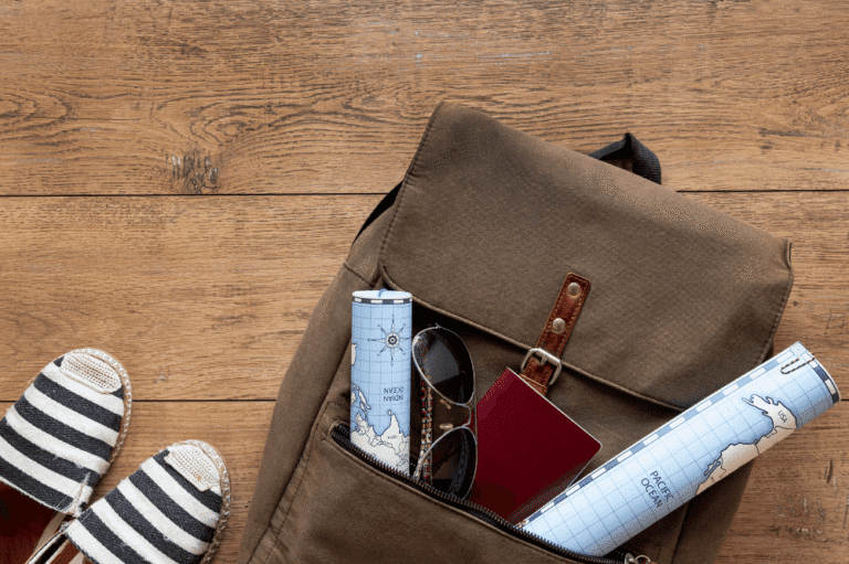 Backpack with maps and passport